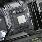 Detailed view of a gaming motherboard, showcasing an AMD processor and components.